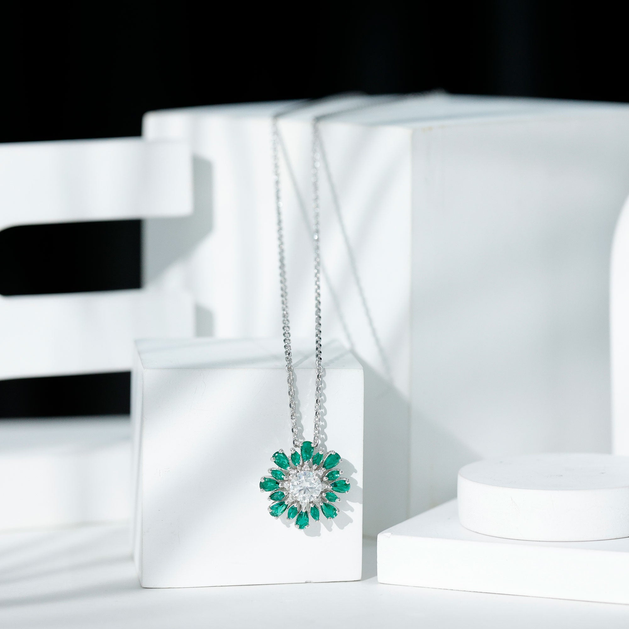 Sparkanite Jewels-Nature Inspired Moissanite Flower Silver Pendant with Lab Grown Emerald